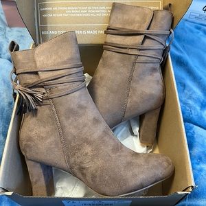 Brand new heeled boots